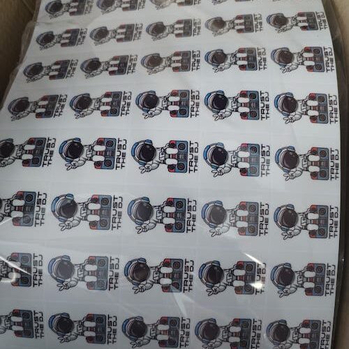 Image shows a sheet of clear vinyl stickers ready for use - printed by BrandXellence vinyl stickers printing